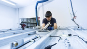 The display in the glasses shows the fitter exact positions and work steps. (Photo: Markus Breig, KIT) The display in the glasses shows the fitter exact positions and work steps. (Photo: Markus Breig, KIT)