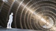 Inside the vessel of the main spectrometer of the Karlsruhe Tritium Neutrino Experiment KATRIN (photo: Michael Zacher) Inside the vessel of the main spectrometer of the Karlsruhe Tritium Neutrino Experiment KATRIN (photo: Michael Zacher)