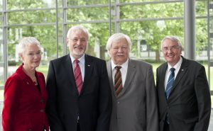 KIT will continue along its path: Vice President Elke Luise Barnstedt, Presidents  Eberhard Umbach and Horst Hippler, and Vice President Detlef Löhe.  (Photo: Sandra Göttisheim)