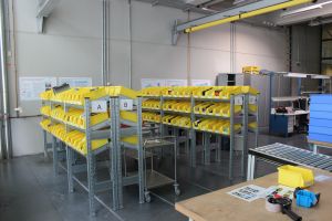 View into the model warehouse: Here, logistics staff is trained and lean management methods are transferred to logistics. 