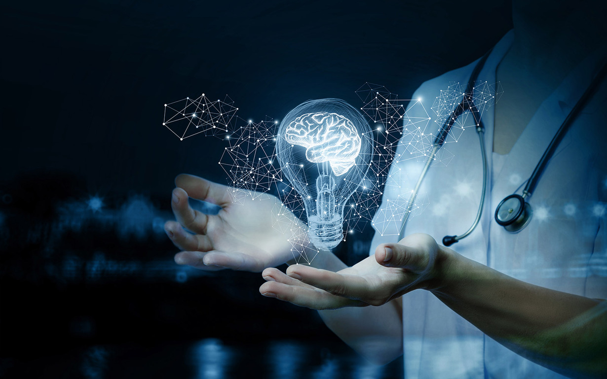  A human holding a light bulb in her hands which has a brain instead of wire inside. network diagrams are displayed around it